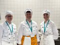 3 Personen in Küchenkleidung